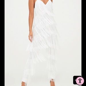 White Tassel Plunge Jumpsuit
Size: 6
Colour: White
Quantity: 1